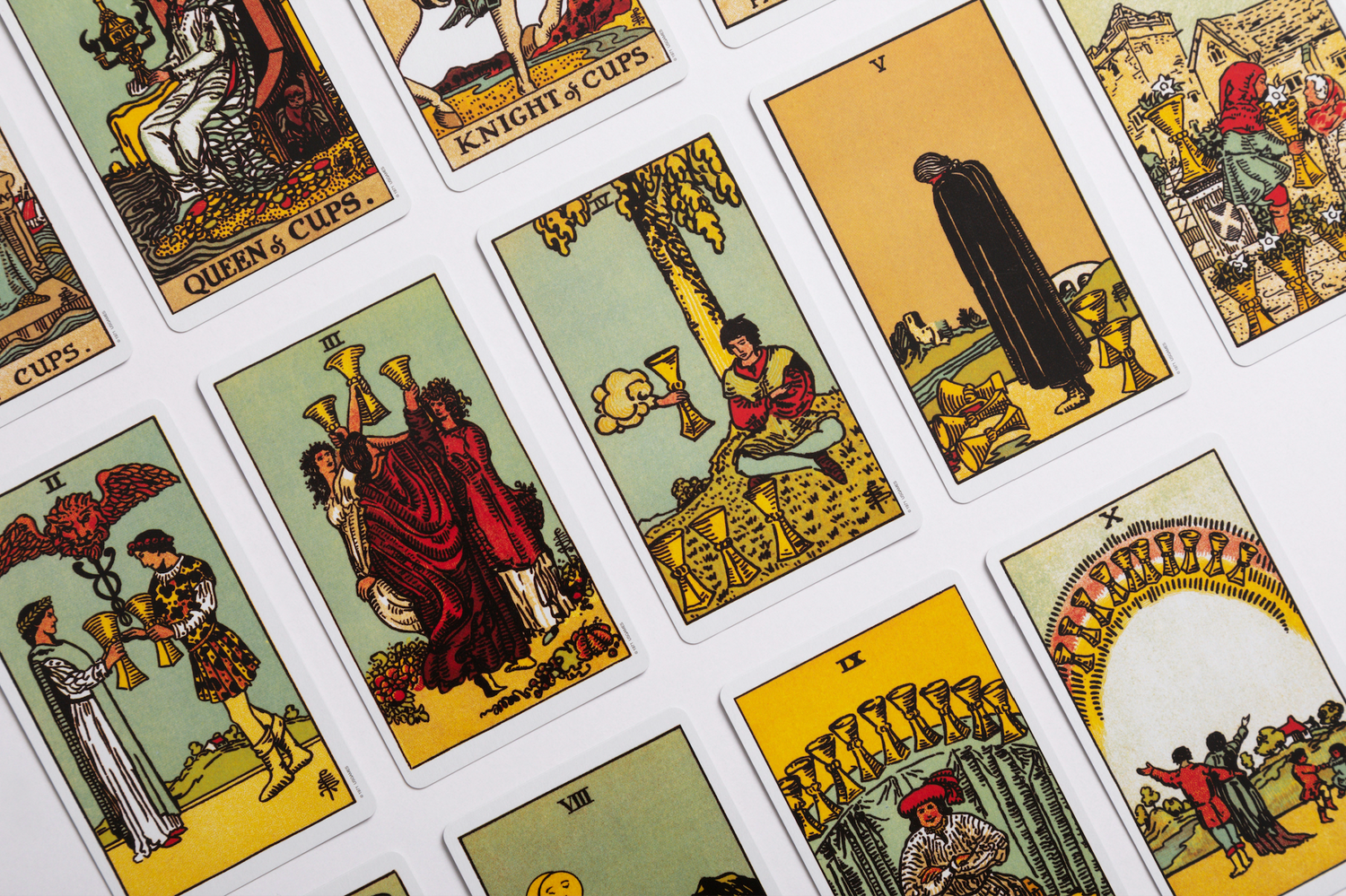 An image of assorted tarot cards lined up in a grid formation